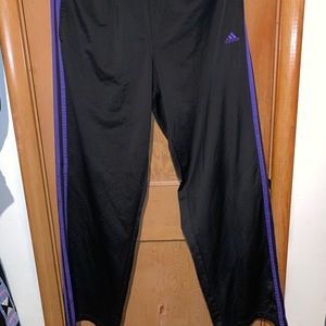 Purple and black boot cut adidas track pants